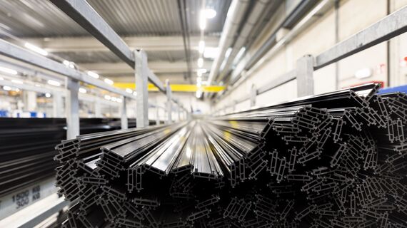 Synthetic thermal strips stacked in iron chassis in warehouse.