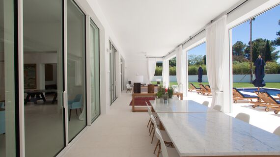 ConceptSystem 77 Doors, ConceptPatio 68 Sliding & Folding and HiFinity Sliding & Folding - Casa Las Palmeras located inSpain